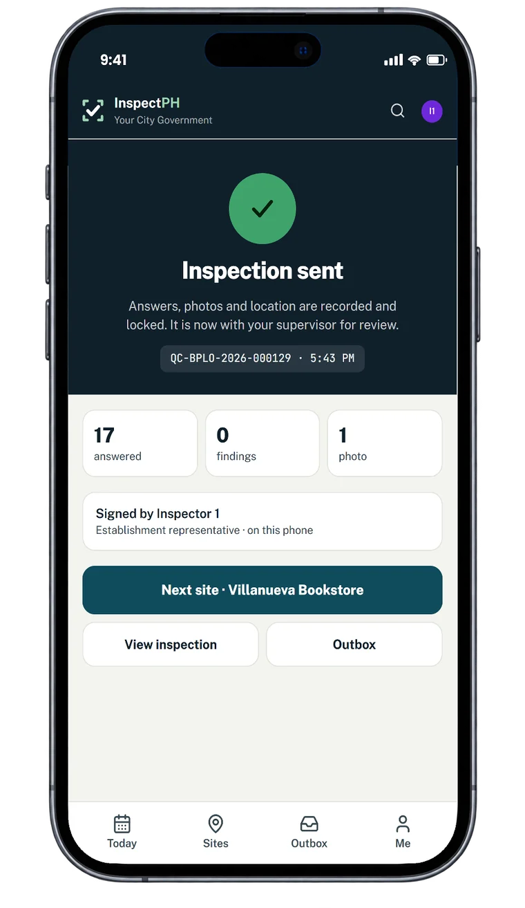 A phone showing an inspection just sent: its reference number and time, how many answers, findings and photos it holds, and who signed for the establishment.